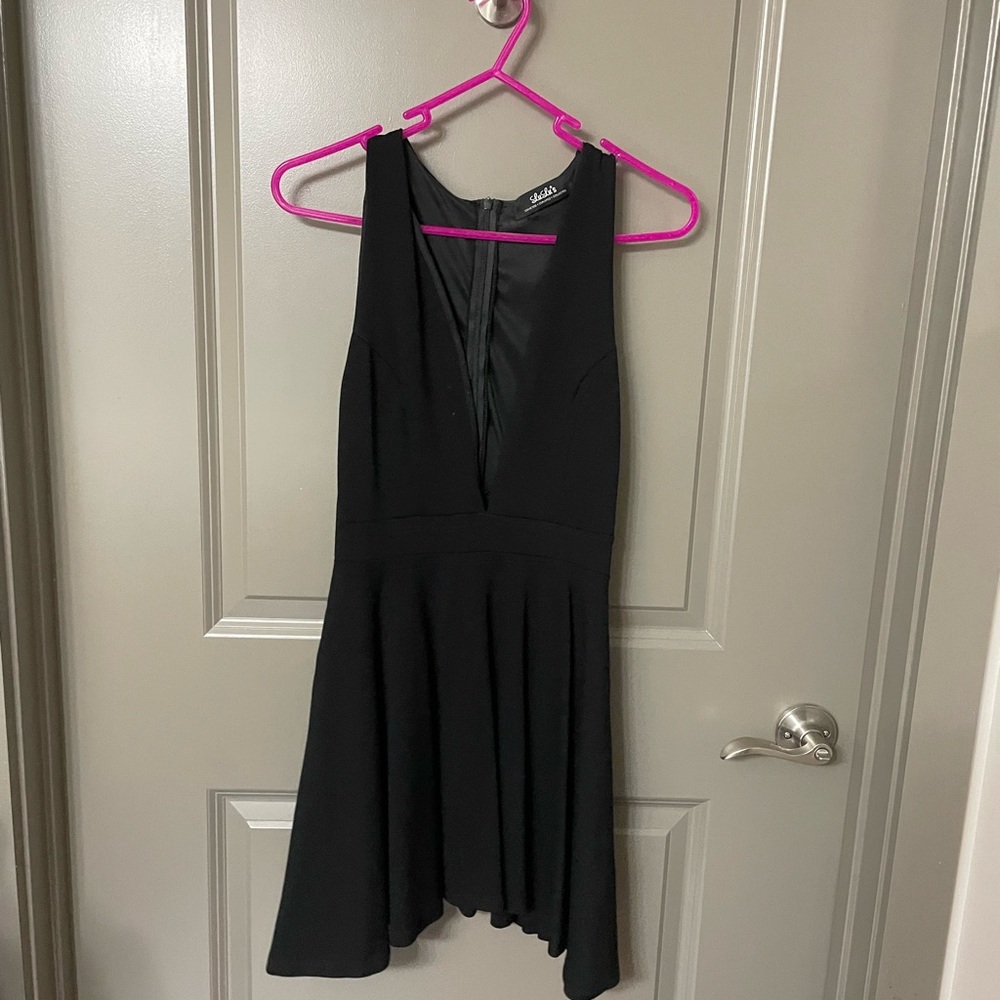 Black low cut LuLu’s cocktail dress. Gently worn in a size small.